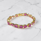 krivoya Ankita tennis bracelet featuring pink stones in gold-plated settings, suitable for smaller wrist sizes.