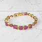 krivoya Ankita tennis bracelet featuring pink pear and square cut stones set in polished gold tone metal