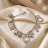 Devnaa Multi-Charm Gold Bracelet with Crystal Accents