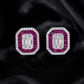 krivoya 92.5 sterling silver stud earrings featuring baguette and round cut ruby and clear stones on black silk